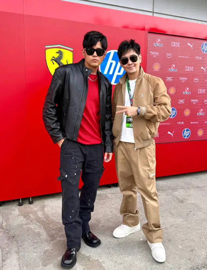 林志颖与周杰伦F1赛道合影，墨镜造型酷感十足-1
